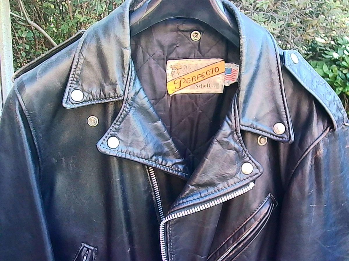 CHAQUETA DE CUERO SCHOTT PERFECTO 118 TALLA 40, DAÑOS BIEN DESGASTADOS, PUÑOS DIVIDIDOS.