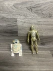 Vintage 1977 Kenner Star Wars C-3PO and R2-D2 action figures