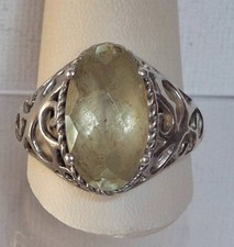 7. 925 STERLING SILVER AND AQUAMARINE LACY RING SIZE 11.5