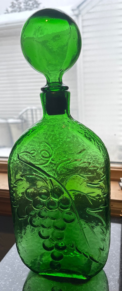 Empoli Italian art-glass green grape decanter — sculptural MCM barware that doubles as shelf art.