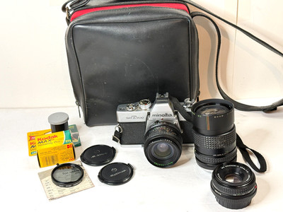 Minolta SRT200 35mm Film Camera w/3 Lenses Bag Film Filter Mechanically Tested