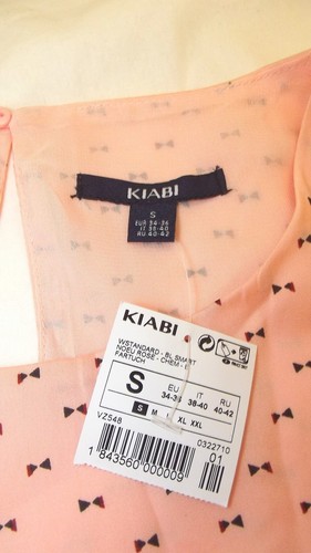 Kiabi Blusa Donna Effetto Raso Scollatura Rotonda Stmapa All Over Senza Maniche - Imagen 51 de 58