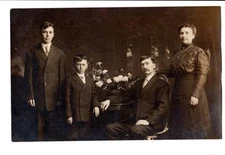 RPPC real photo family parents two boys brothers portrait