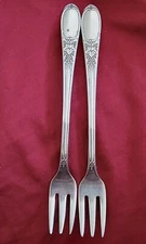 (2) W.M. Rogers AA IS  Burgundy Champagne 5.5" Oyster Fork 1934