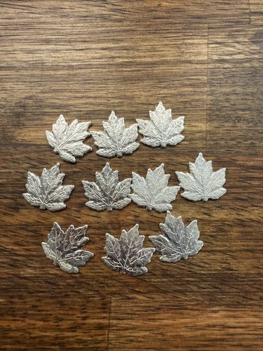 Lot of 10 - 1 Gram .999 Fine Silver Maple Leafs.