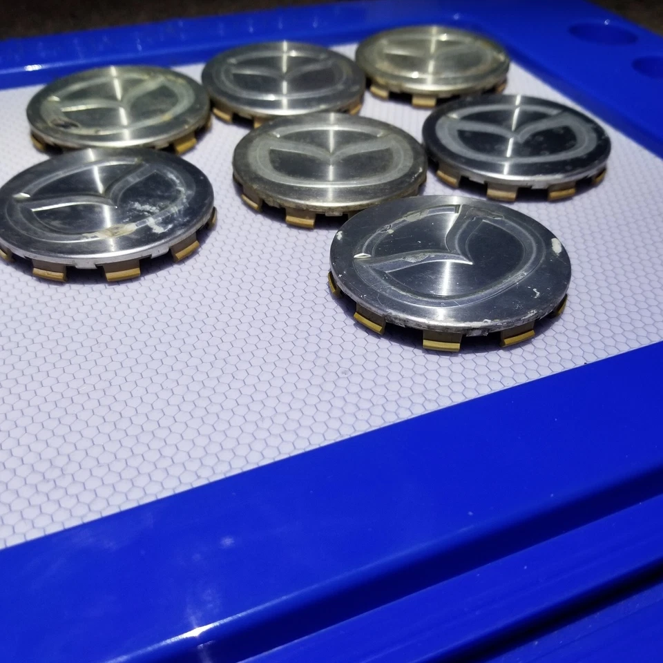 Lote de 7 Tapacubos Mazda 626 Protege Millenia Tapacubos Mecanizados 2.25" Fabricante de Equipo Original Foto 3 de 4