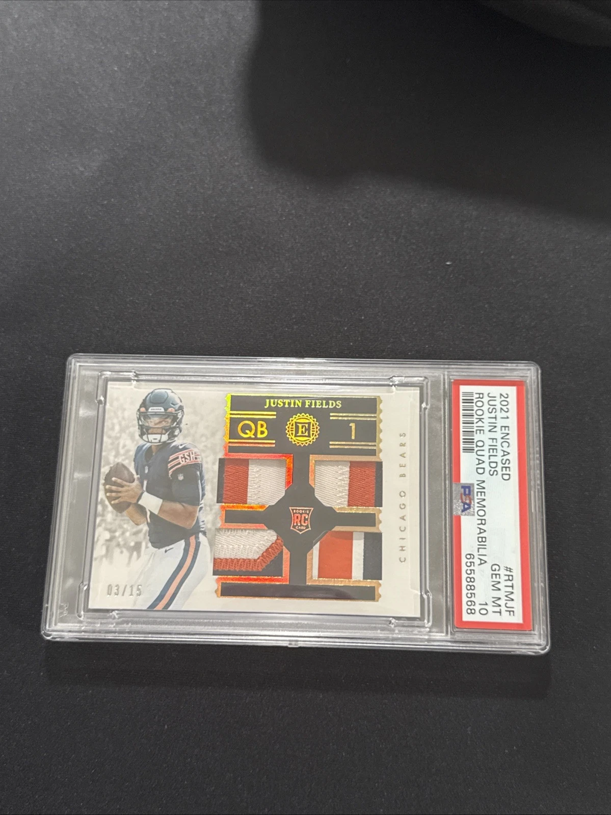 Justin Fields Panini Encased Rookie Quad Memorabilia #RTMJF Base