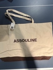Assouline large beige and brown canvas tote bag.