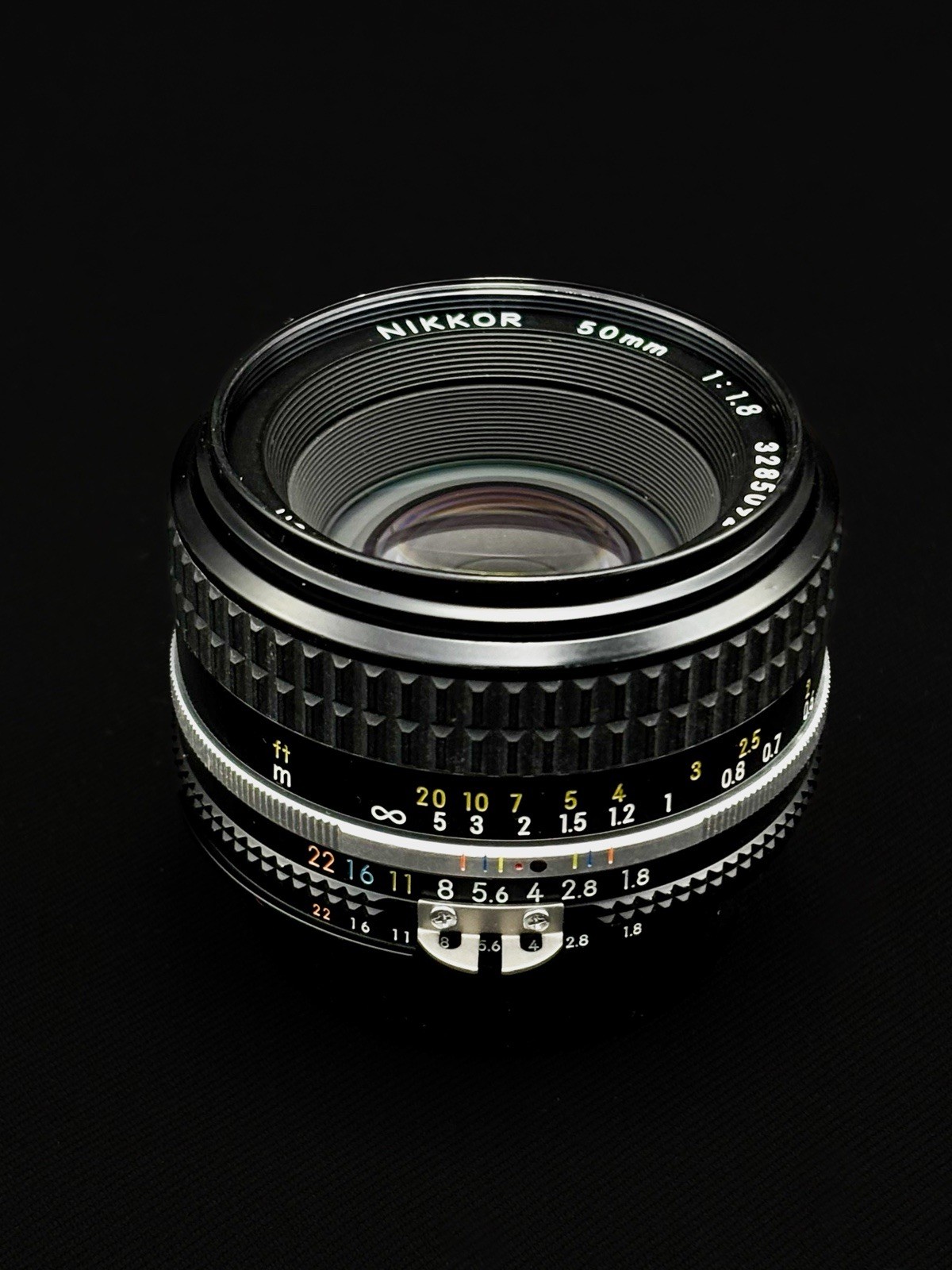 Vintage Nikon Nikkor 50mm AIS lens CLAd in amazing shape and