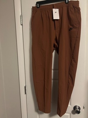NWT Nike Dri-FIT Unlimited Tapered Leg Versatile Training Pants Men
