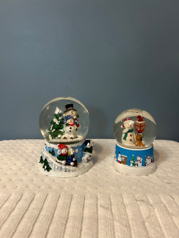 Lot of 2 Snow Globe one Hallmark & ond musical 