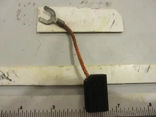 E47 535 Electric carbon motor brush.  1/2" thick x 5/8" wide x 1" long.