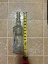 Clear Glass Collectible Decorative Bottle 16 oz Embossed Modern 13 Inch
