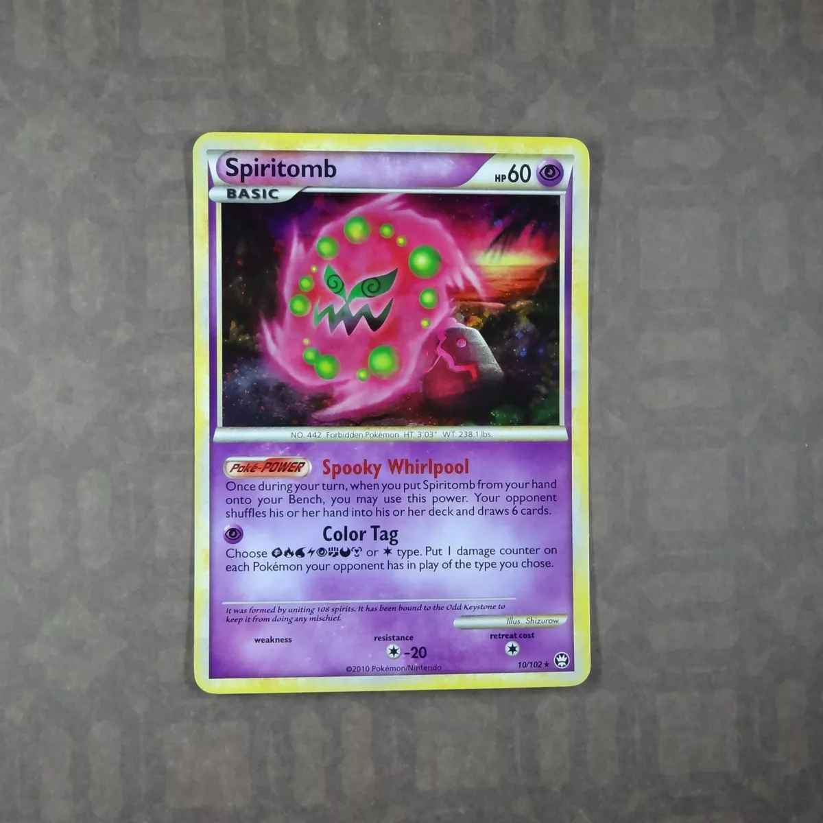 Spiritomb Holo - Triumphant Pokémon card 10/102