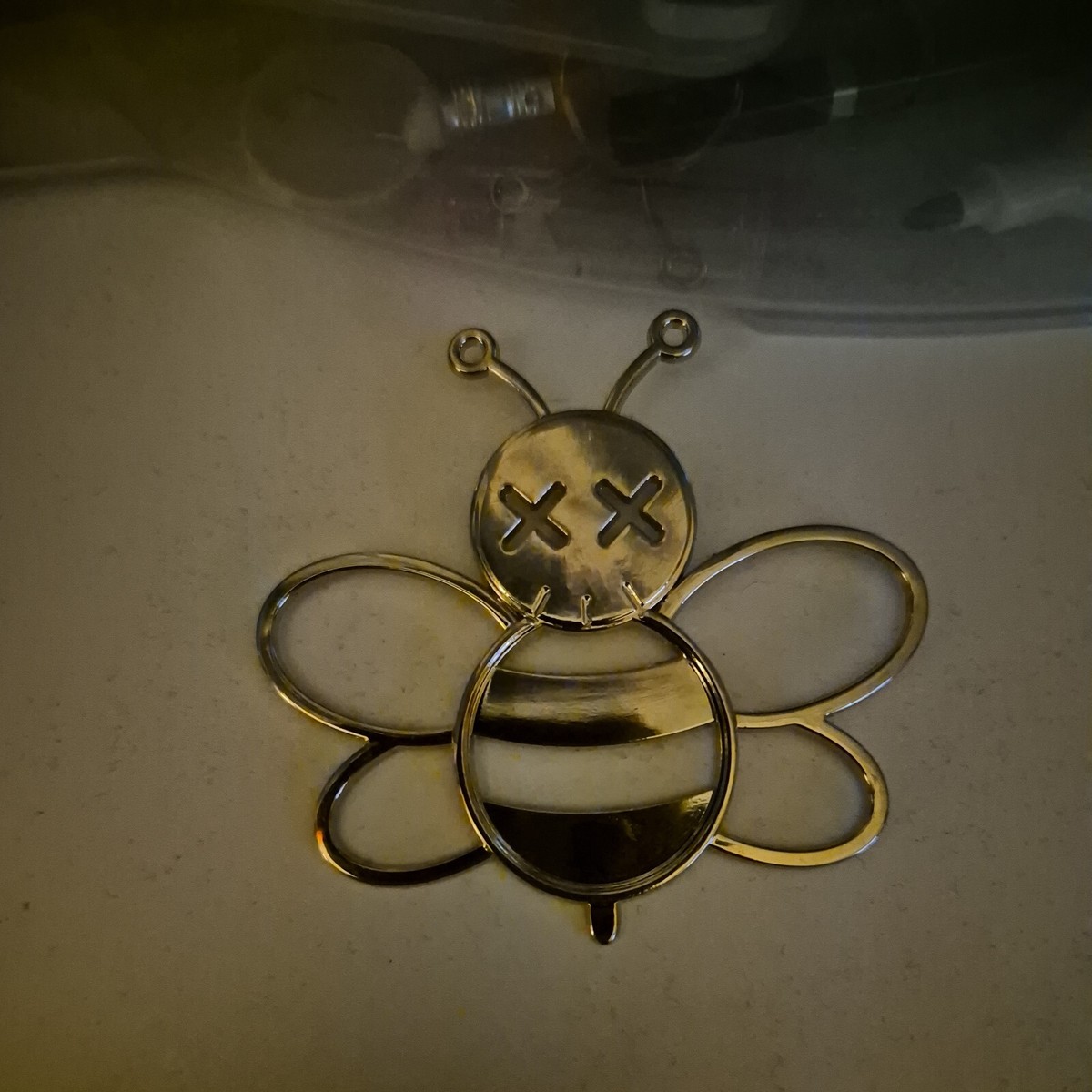 kaws x dior charm