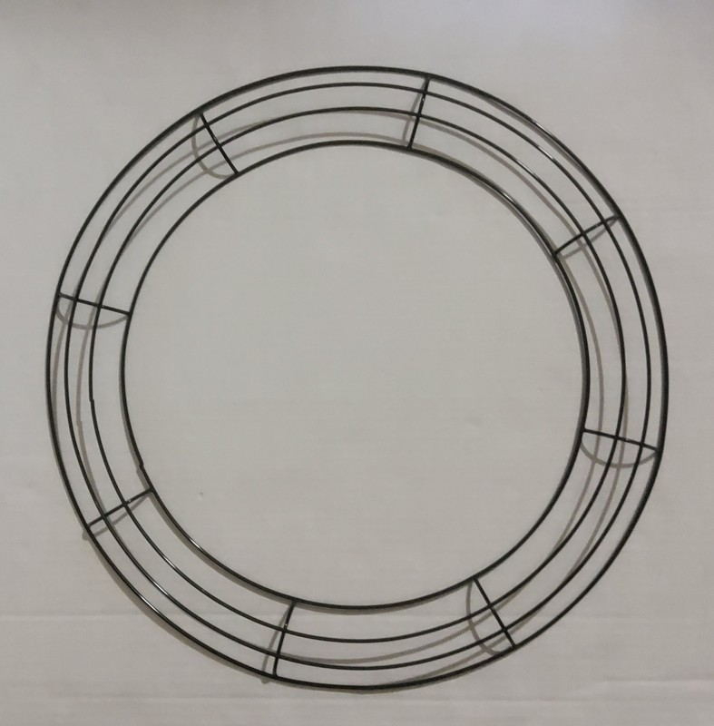 One 16" metal round wreath frame and Three 11 3/4" metal round wreath frames