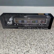 1/64 Spec-Cast International 8600 Tractor Trailer Kent Blue Seal Feeds 