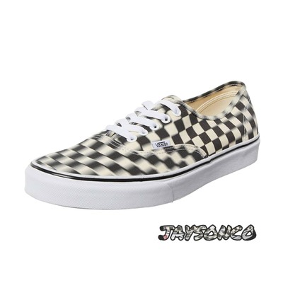 blurred checkerboard vans