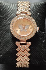 Reloj mariposa tono oro rosa con detalles de cristal