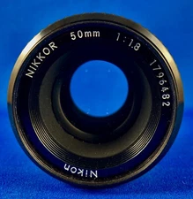 Nikon Nikkor 50mm F/1.8 Manual Focus Lens Good Shape w/Caps and Filter