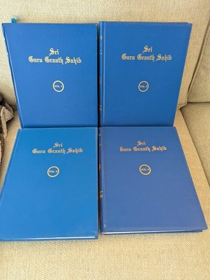 Guru Granth Sahib in English.  A set of 4 books.  Author is Dr. Gopal Singh