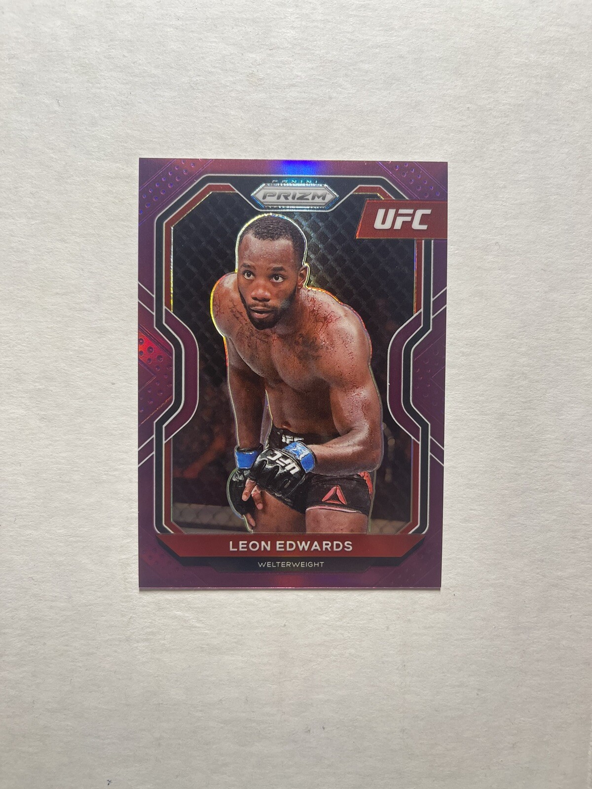 Leon Edwards 2021 Panini Prizm UFC #17 Purple Prizms /149 Champion