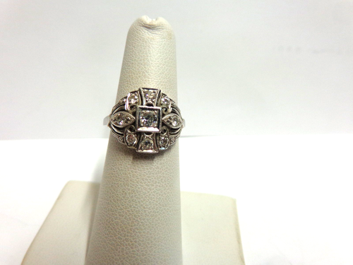 Vintage platinum diamond ring sz 5.50 wgt5.5 grams 9 rd cut diamonds .50 points