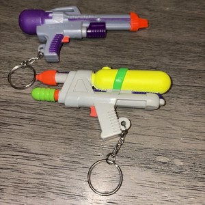 Vintage 1995 1997 Larami Super Soaker Keychains Lot Of 2
