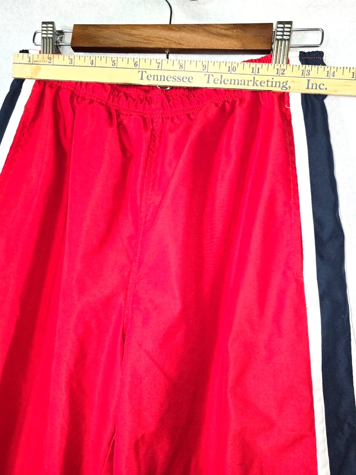 Pantalones deportivos a rayas TOMMY HILFIGER talla S de nailon rojo azul blanco usados en excelente estado Foto 4 de 4