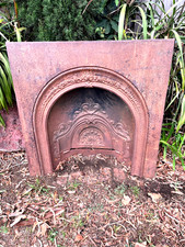 FIRESIDE  SURROUND CAST IRON ( SCHOTS MELB. )  LOOKS GC ALL OVER