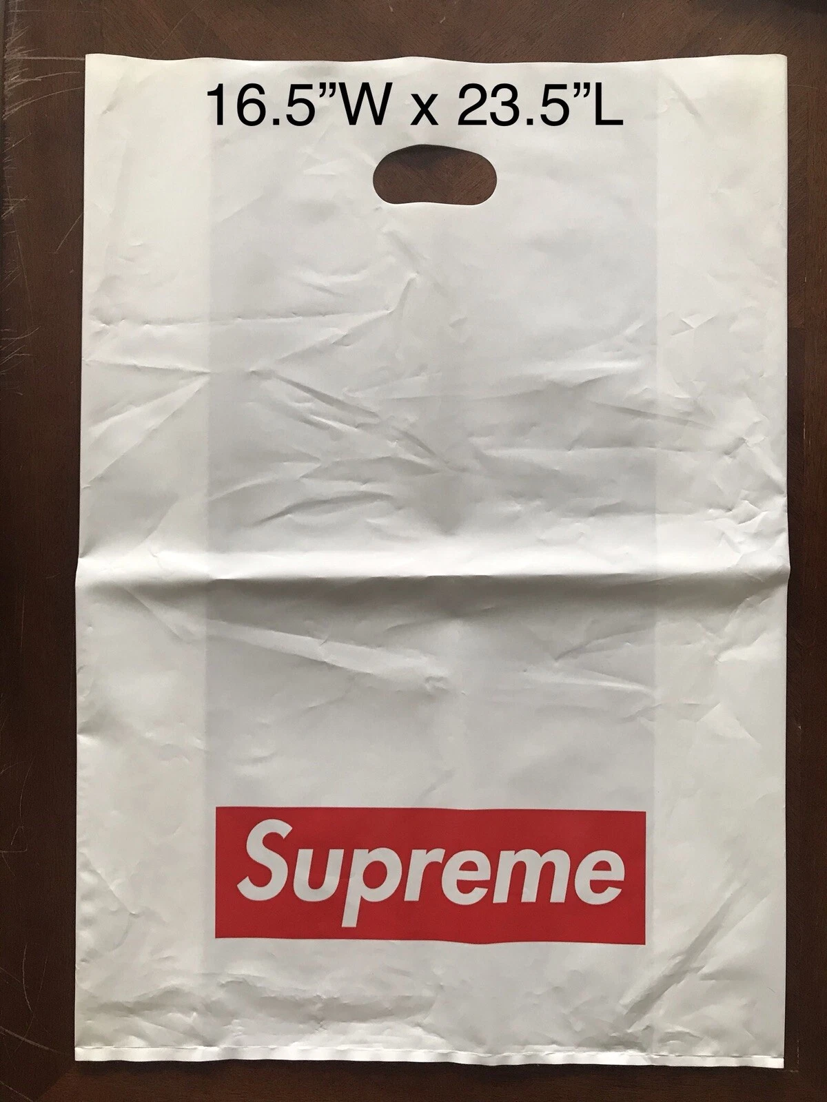 Grand sac à provisions en plastique Supreme logo boîte rouge 16,5 pouces x 23,5 pouces 100 % authentique