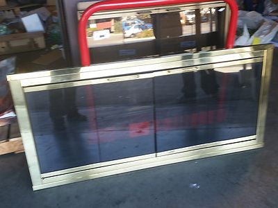 Wide Brass Finish Glass Fireplace Door 56 x 26 1/2'' with Curtain Mesh