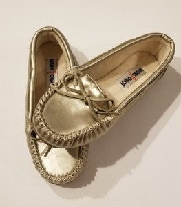 gold moccasin slippers