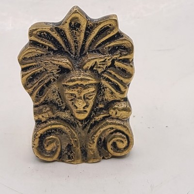Brass Grecian style paperweight with face and scroll. 2 in. Vintage