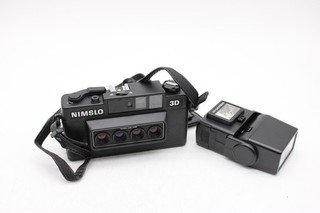 F Nimslo 3D film camera with Quadra 30mm lens flash and carry bag. Not tested