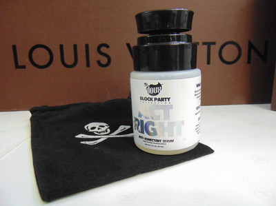 THE DOUX act right FRIZZ FIGHTING FINISHING SERUM shine seal block party 2 oz