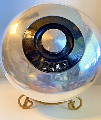 CAKE COVER-KROMEX- PLASTIC WORD ''CAKE'' ON TOP TOPPER BRUSHED ALUMINUM