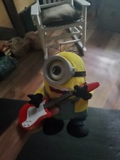 Minions Rock N Roll Stuart Animated Plush Despicable Me. Item is in good used...