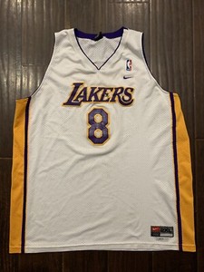 white and gold lakers jersey