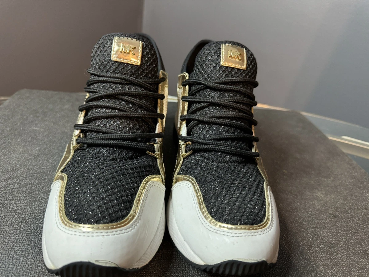 Michael kors hotsell hidden wedge sneakers