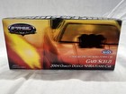 1 24 2004 Oakley Dodge NHRA Funny Car drive by Gary Scelzi PMC