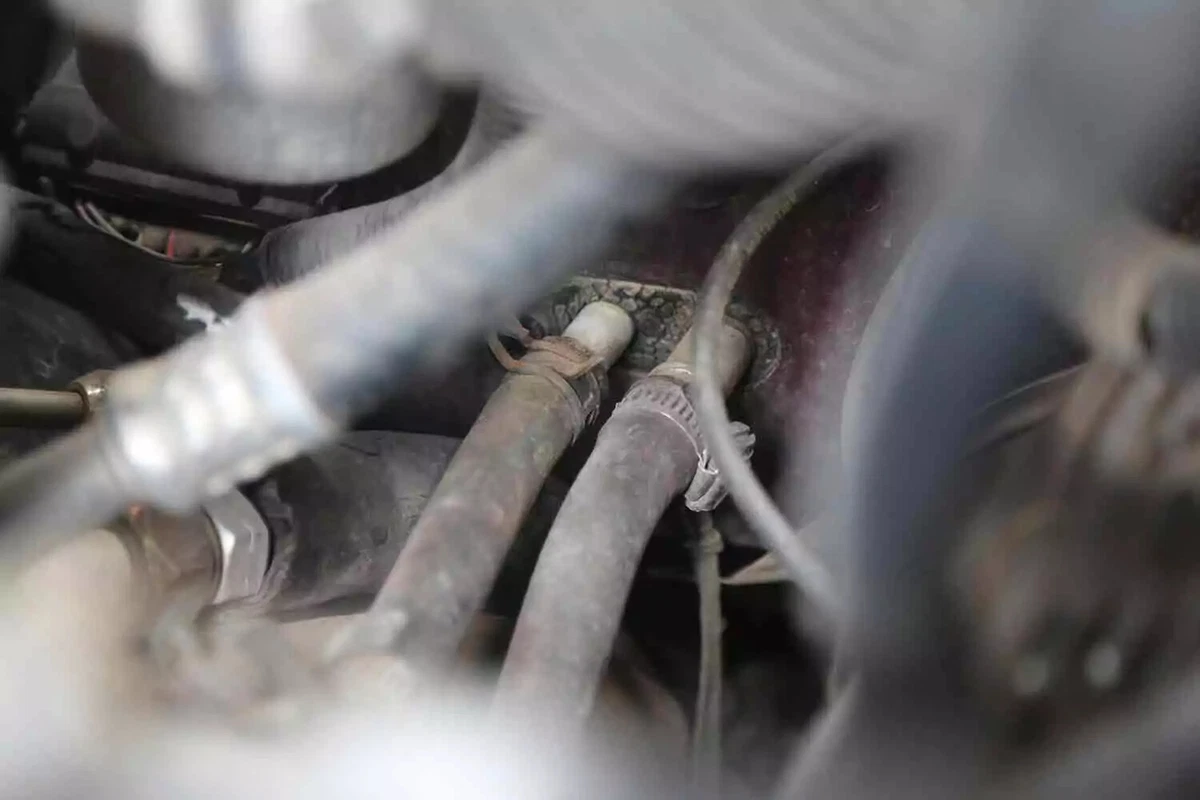 The heater core connections seen in the center of the image.