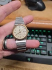 Vintage Timex Manual Wind Watch Steel Stretch Band Works Gold Tone Case Date