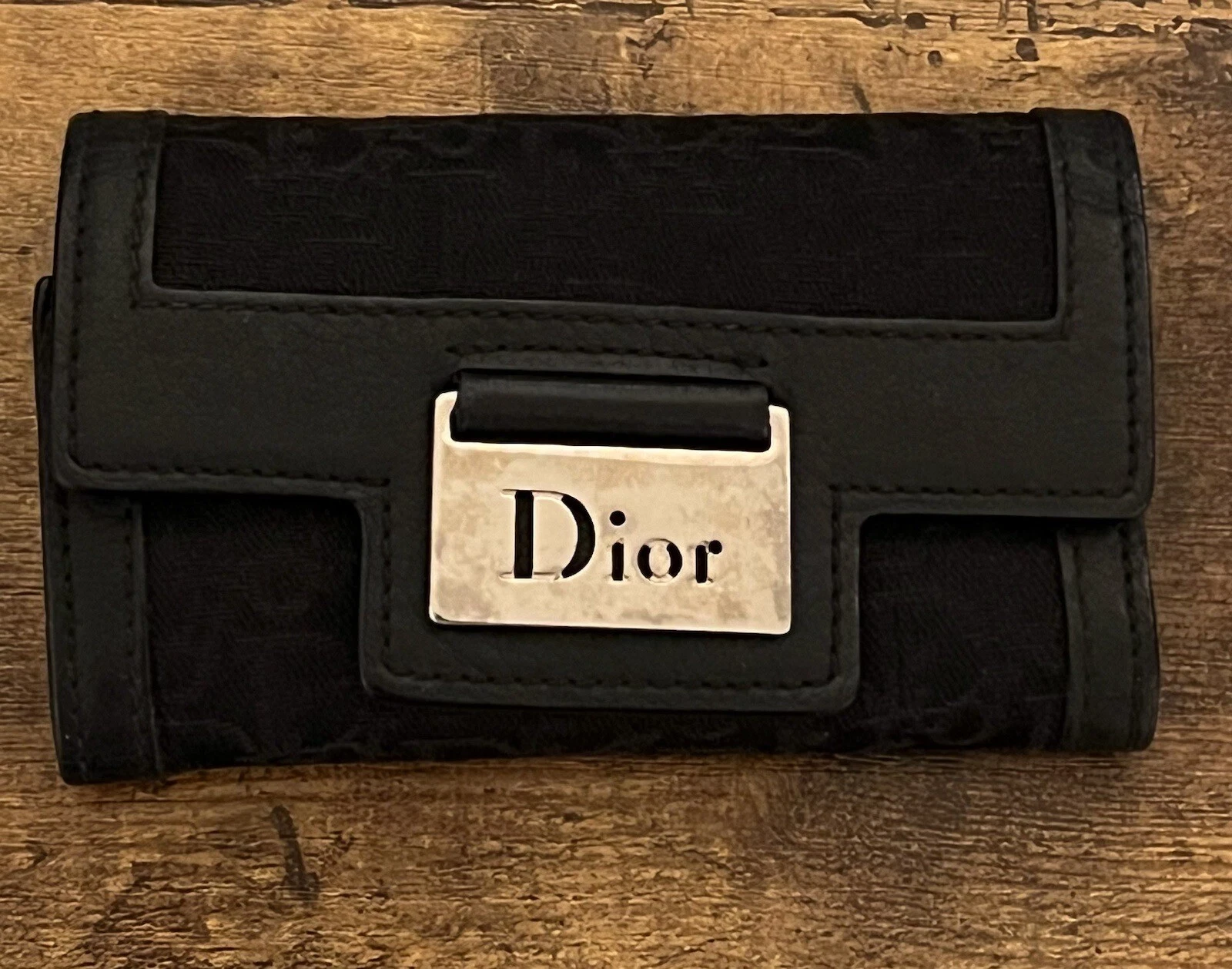 Portefeuille Christian Dior toile noire triple pli authentique vintage ! Très bon état !