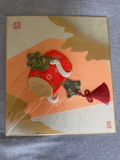 Snake and gavel Lucky charm Colored paper designed with cloth