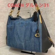 Borsa a tracolla Coach Dalton 31 in pelle denim blu/nero usata