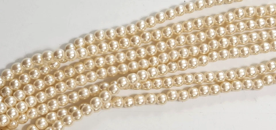 Collar Avon de 7 hilos de perlas de imitación de vidrio crema estilo clásico de moda Foto 3 de 4