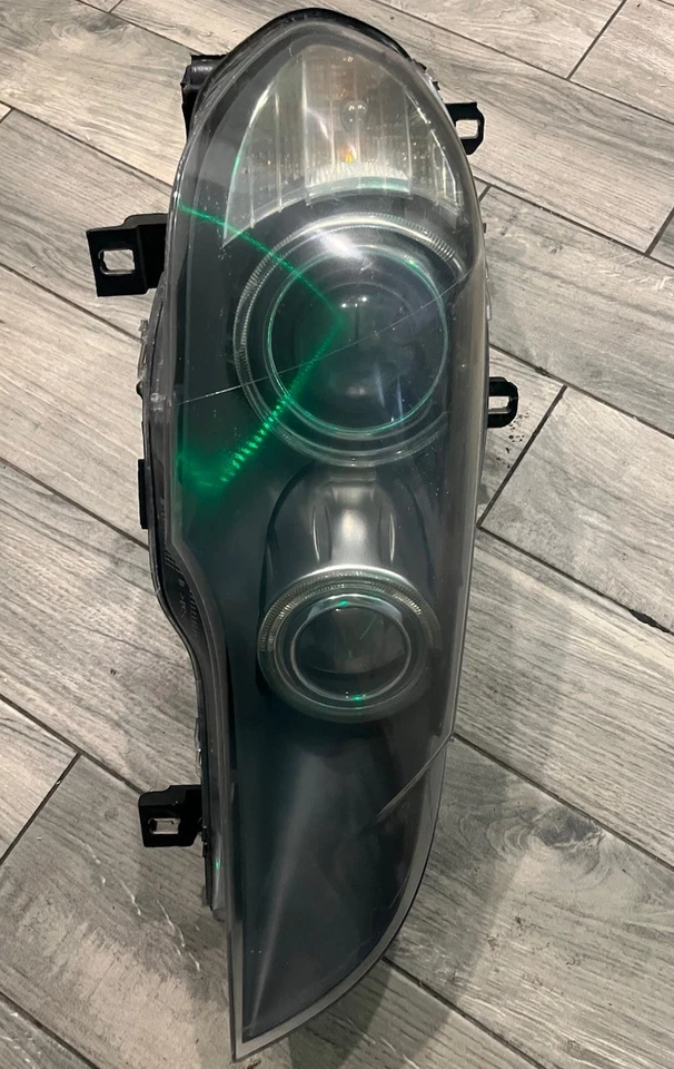 Faro oculto de xenón para pasajero derecho BMW X5 X6 E70 2007-2011 FABRICANTE DE EQUIPOS ORIGINALES Foto 2 de 4