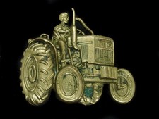 UB13134 VINTAGE 1978  TRACTOR  SOLID BRASS DIE CUT BARON BELT BUCKLE