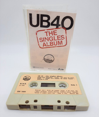 UB40 - The Singles Album (Audio Cassette, 1985, Ariston) GRK 76001